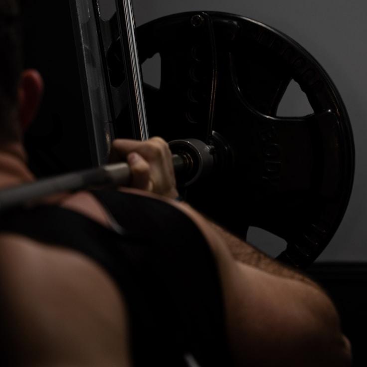 Women in a fitness class doing stretching and mobility exercises